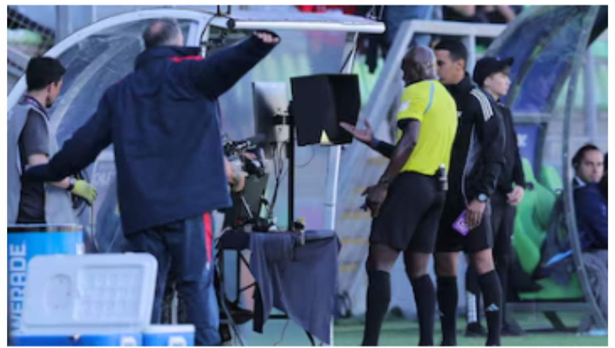 Historic First FIFA Referee Uses Green Card